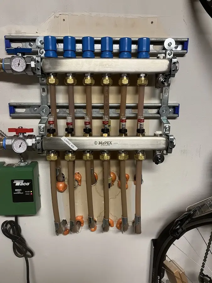 Plumber performing Leak Detection at a residential property in Pewaukee